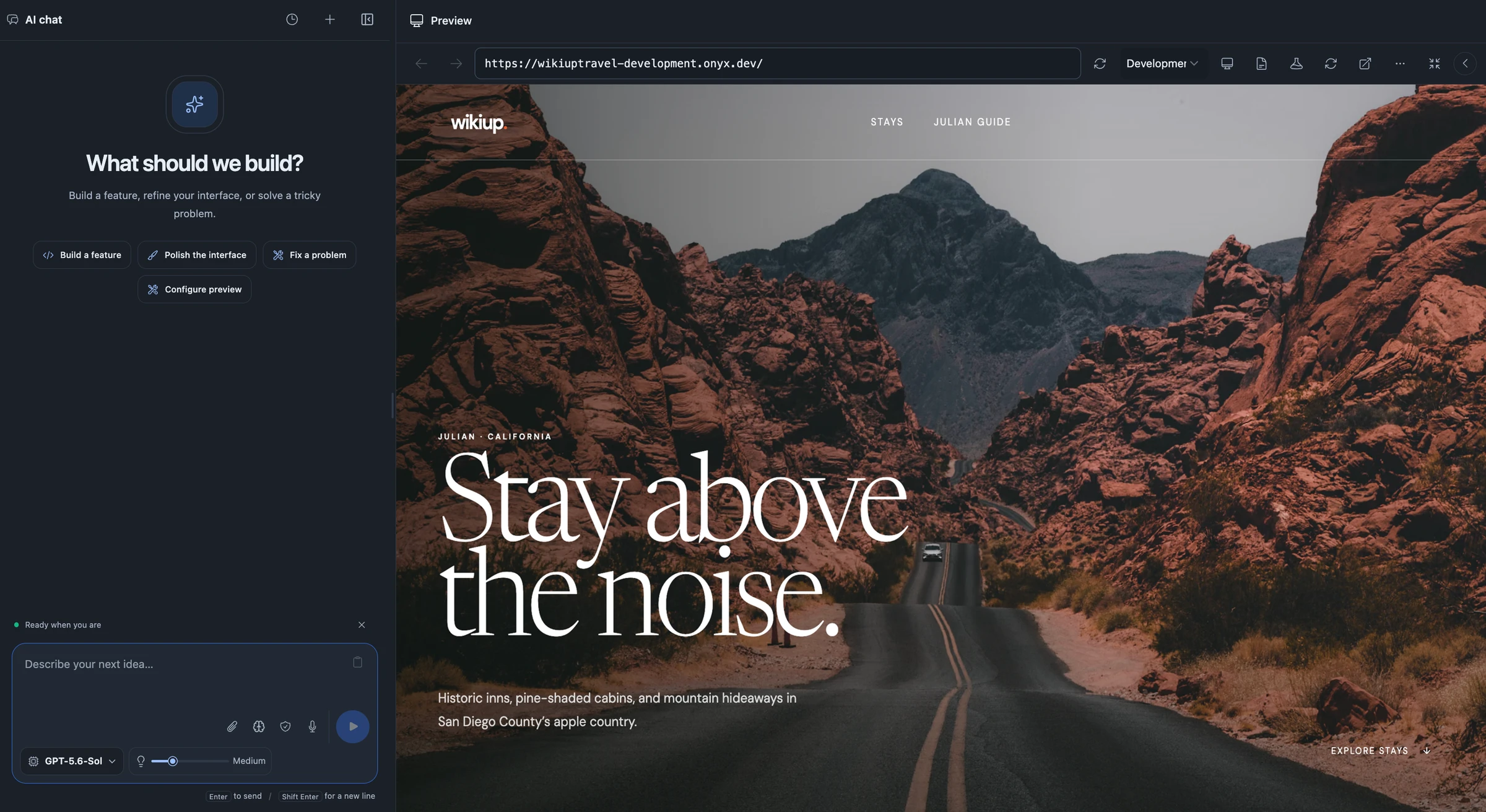 Onyx workspace with the AI chat panel and ‘Describe your next idea’ composer on the left, beside a browser preview of the Wikiup travel website showing ‘Stay above the noise’ over a mountain road.
